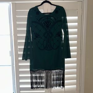 Cocktail Dress with embroidery detail and jazzy string thigh detail